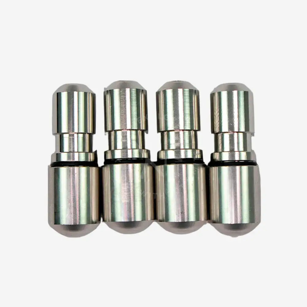 A set of four silver-colored metal weights with O-rings, arranged side by side.