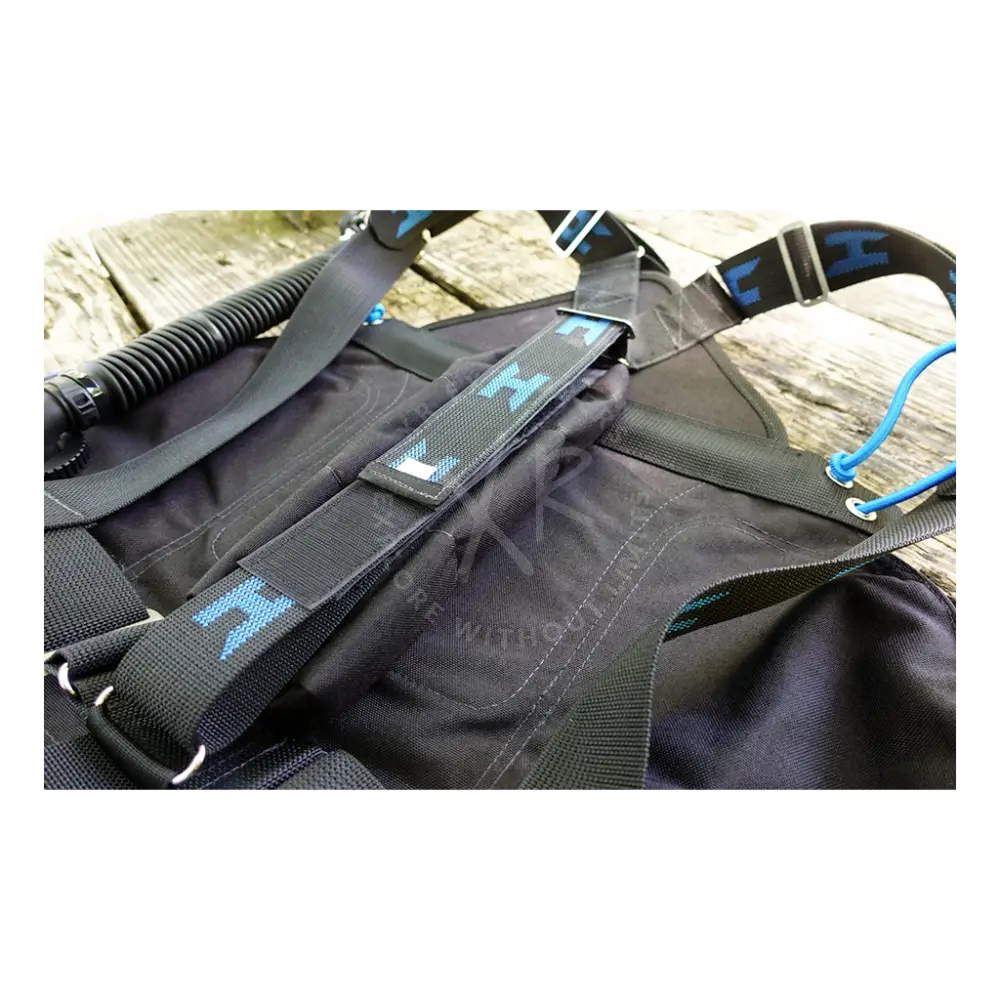 Black halcyon zero gravity weight pouch diving vest with blue logo accents and adjustable straps visible from the back