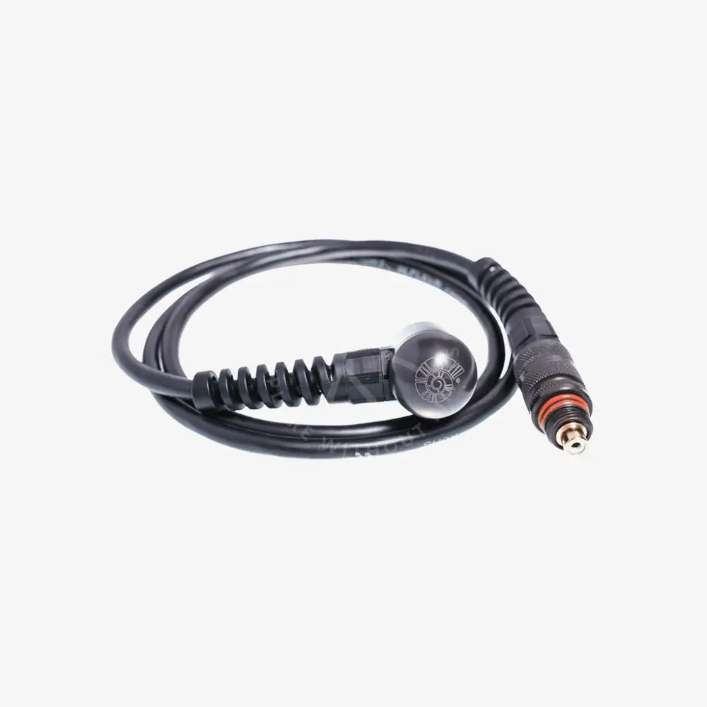 Coiled black cable with a metal connector on a white background