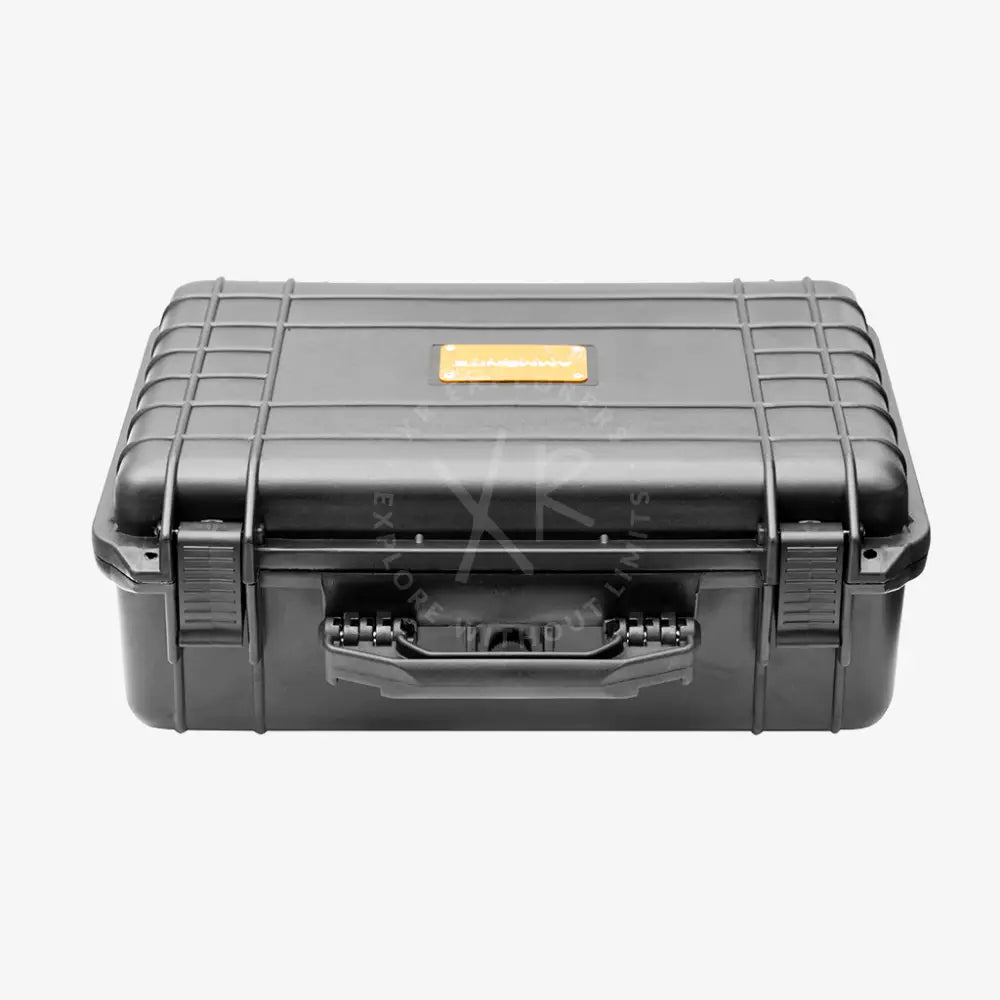 Heavy-duty case black rugged hard-shell with textured grid pattern and orange label on the lid for secure storage