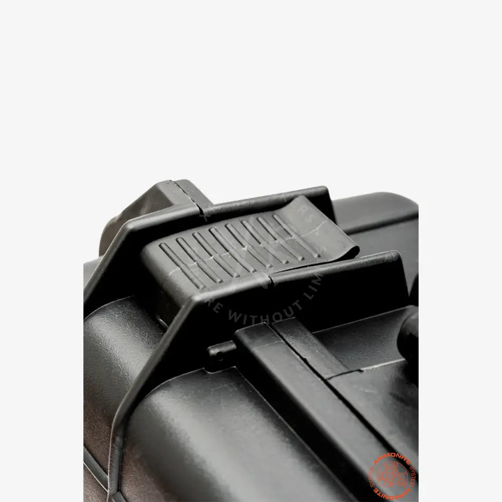 Black plastic heavy-duty case magazine well with textured grip ridges designed for secure handling