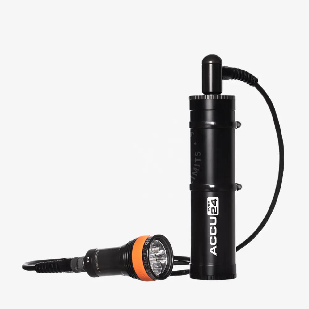 Black and orange underwater diving flashlight with cylindrical housing and accu24 type 24 branding in led solaris nextgen kit