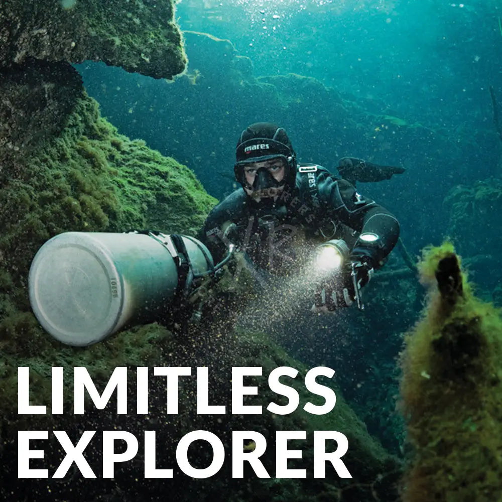 Black mares diving suit with integrated helmet mask and bright headlamp illuminating underwater in Limitless Explorer Bundle