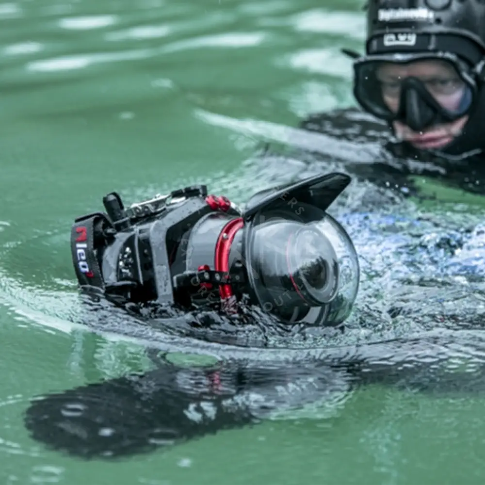 MOBY camera mount black and red underwater housing with clear dome port for waterproof photography