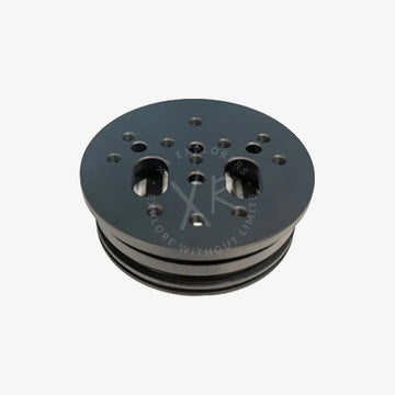 Black metal pulley with multiple holes and slots used as a rotating plate spare part for moby products