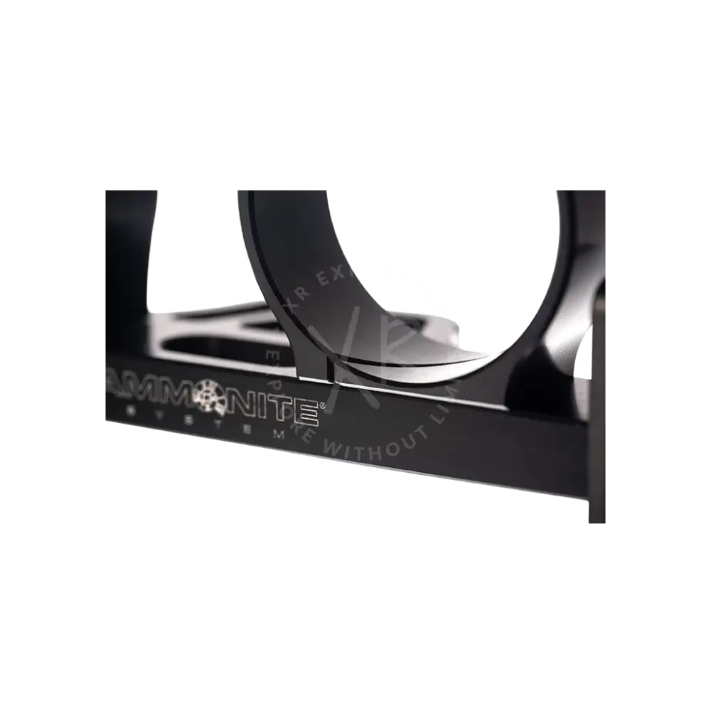Black matte-finished ammonite system firearm mounting bracket with sleek angular design for modular goodman handle
