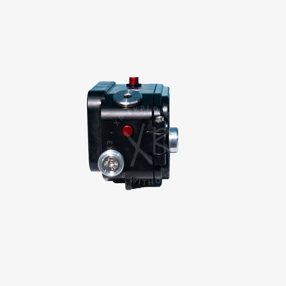 Black osmo action compact camera with red buttons and silver accents shown from the back side