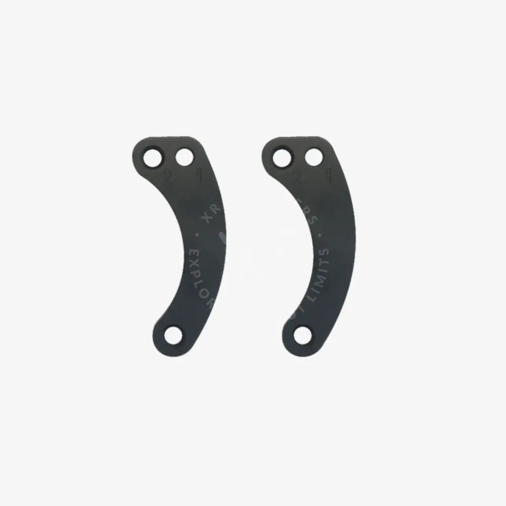 A pair of professional tensioners with sleek curved matte gray metal brackets featuring three drilled holes each