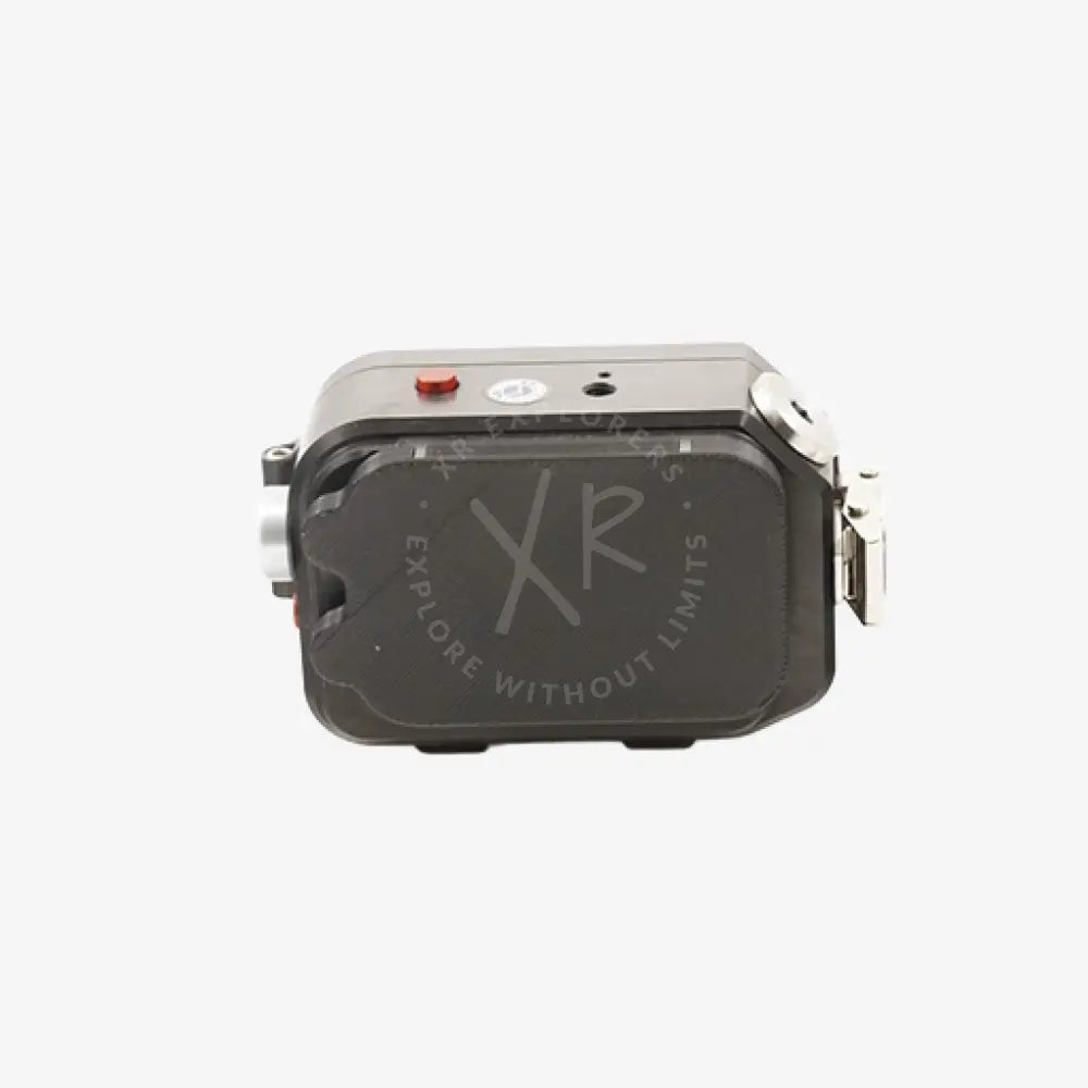 Gray rectangular waterproof action camera with red button and silver accents in protection cups housing