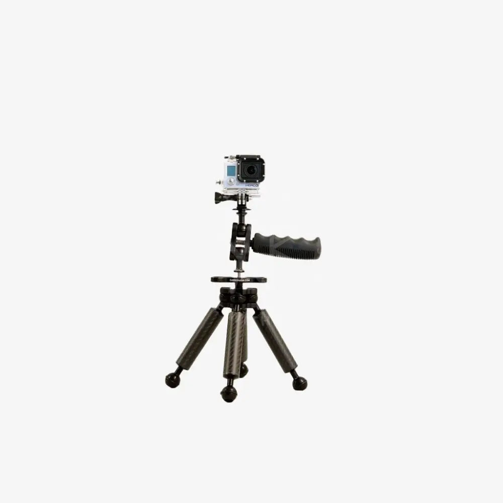 Black carbon fiber tripod with quadruple clamp and handle grip mounted with gopro camera for stable shooting