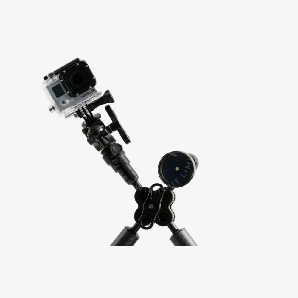 Black gopro hero camera mounted on flexible tripod with adjustable joints and three legs in quadruple clamp setup