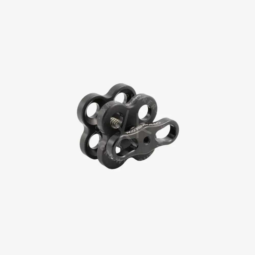 Black metal quadruple clamp camera rig adapter with sleek industrial design and multiple circular openings