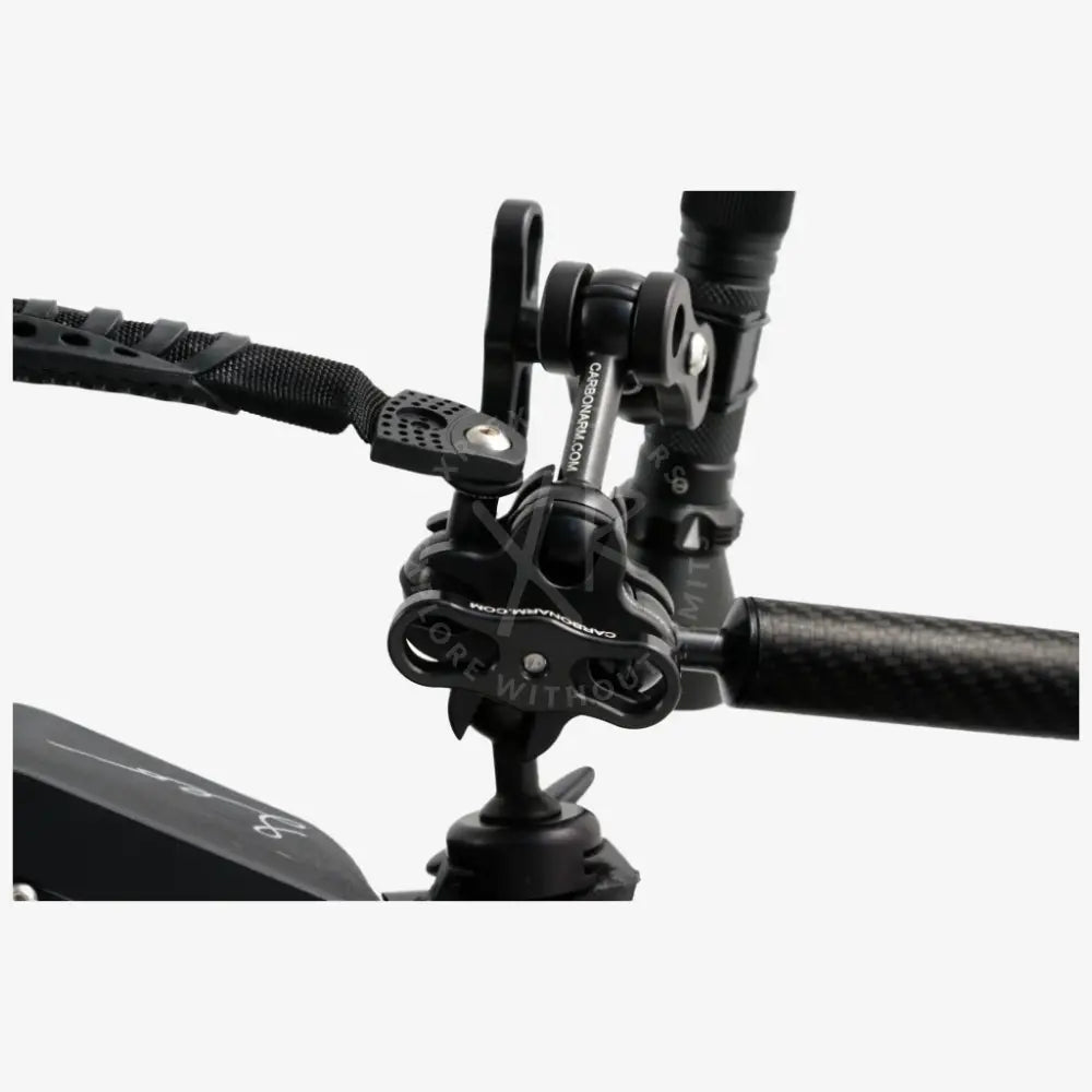 Black carbon fiber quadruple clamp handlebar mount with adjustable clamp and quick-release mechanism