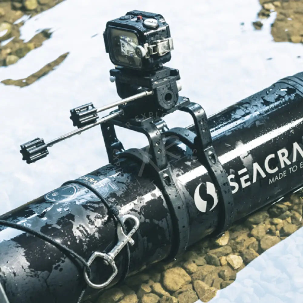 Black waterproof ROTO camera mount secured on rugged metal bracket attached to a seacraft diving tube with textured grip