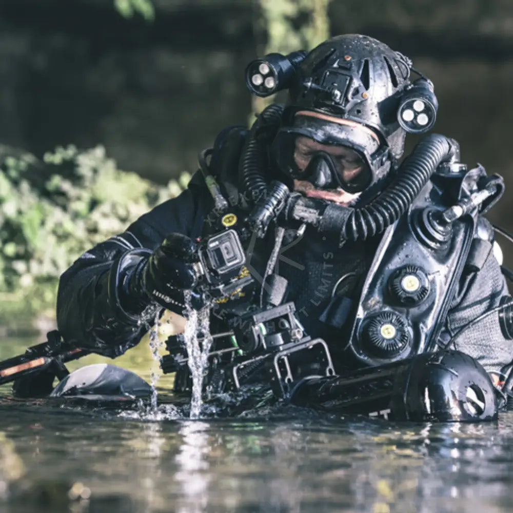 Black tactical diving suit with integrated helmet and ROTO camera mount for underwater operations