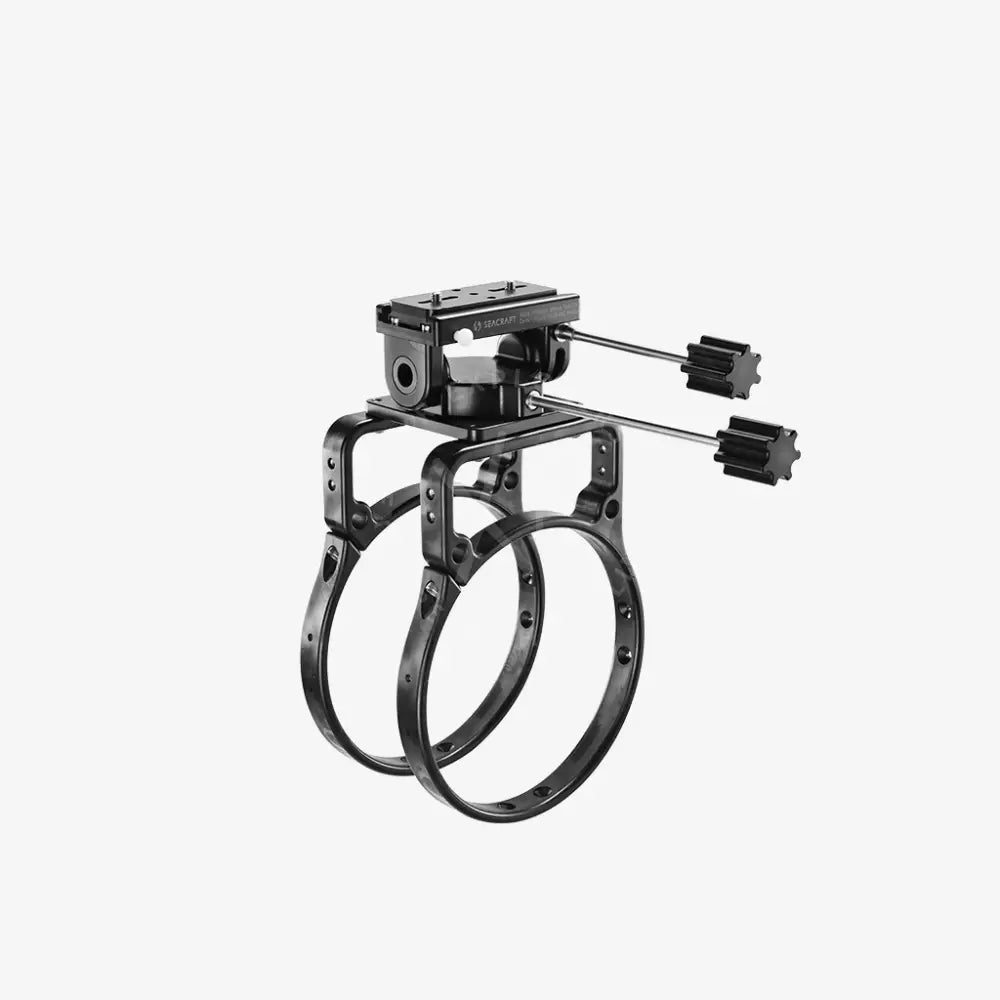 Black metal roto camera mount cage with adjustable arms and top-mounted quick-release plate for secure shooting setup