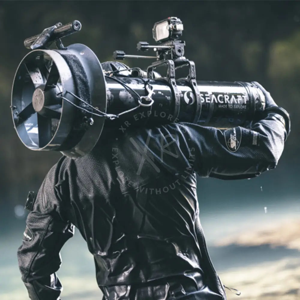 Black seacraft underwater propulsion device with fan and roto camera mount attached on top for underwater filming