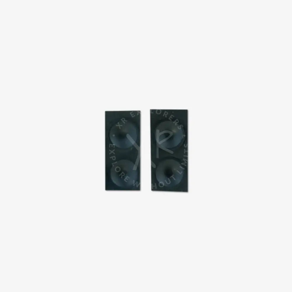 Black rectangular speakers with two circular drivers each designed as rubber buttons for steering module use