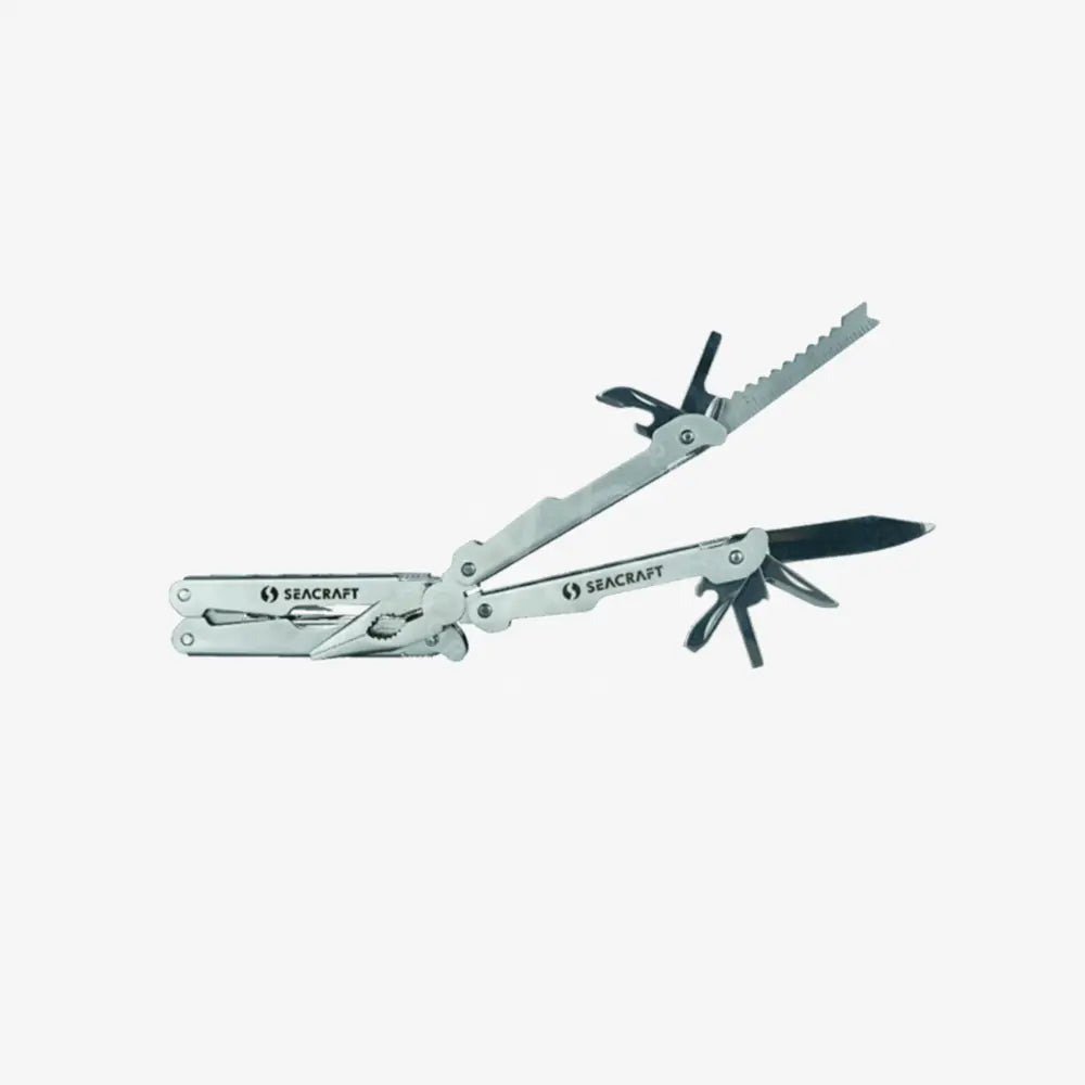 A Seacraft Multitool with multiple implements, such as a screwdriver and pliers, in silver color, folded and ready for use.