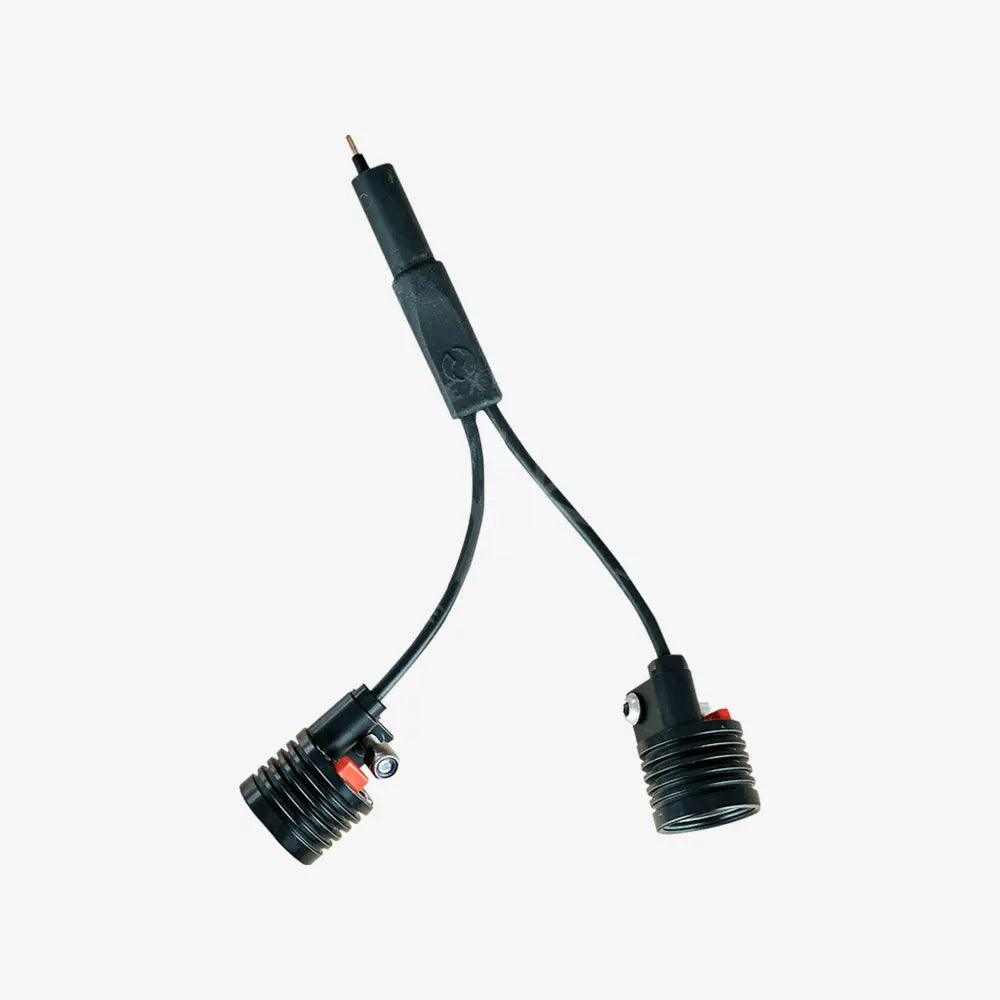 Two underwater lights connected by a y-cable with an on/off switch, primarily black in color.