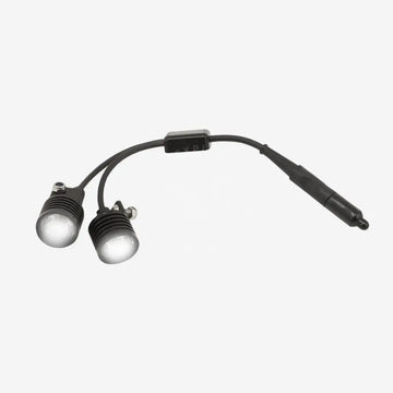 Two underwater lights connected by a y-cable with an on/off switch, primarily black in color.