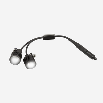 Two underwater lights connected by a y-cable with an on/off switch, primarily black in color.