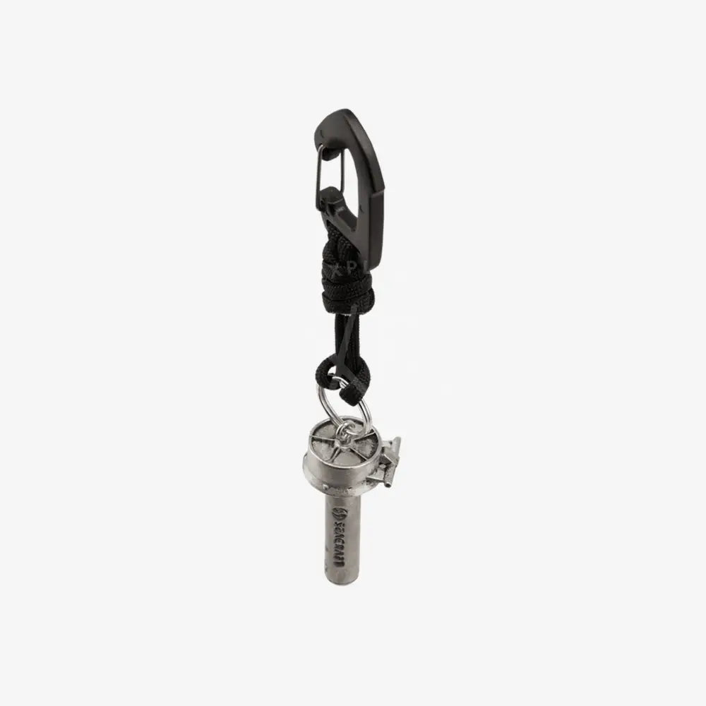 Keychain with a carabiner and metal tag on a white background