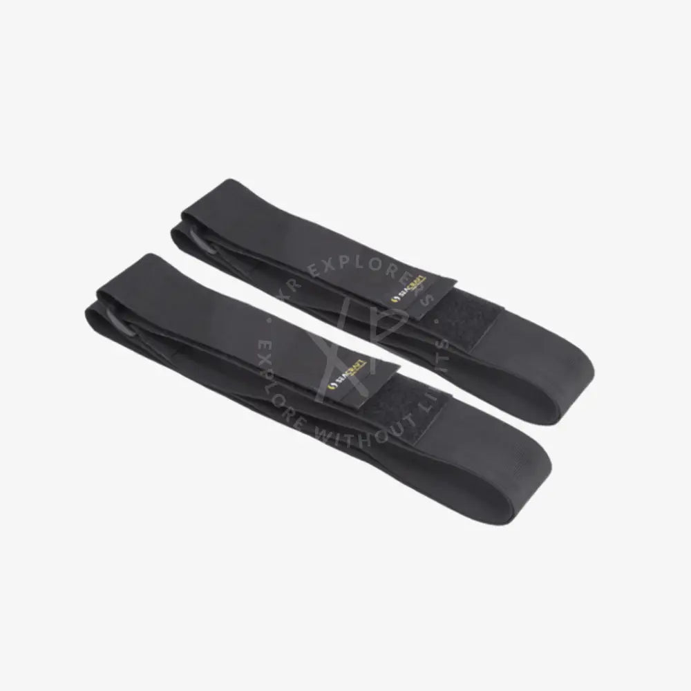 Black fabric secure straps with velcro closures and small gold logos for adjustable fastening and support