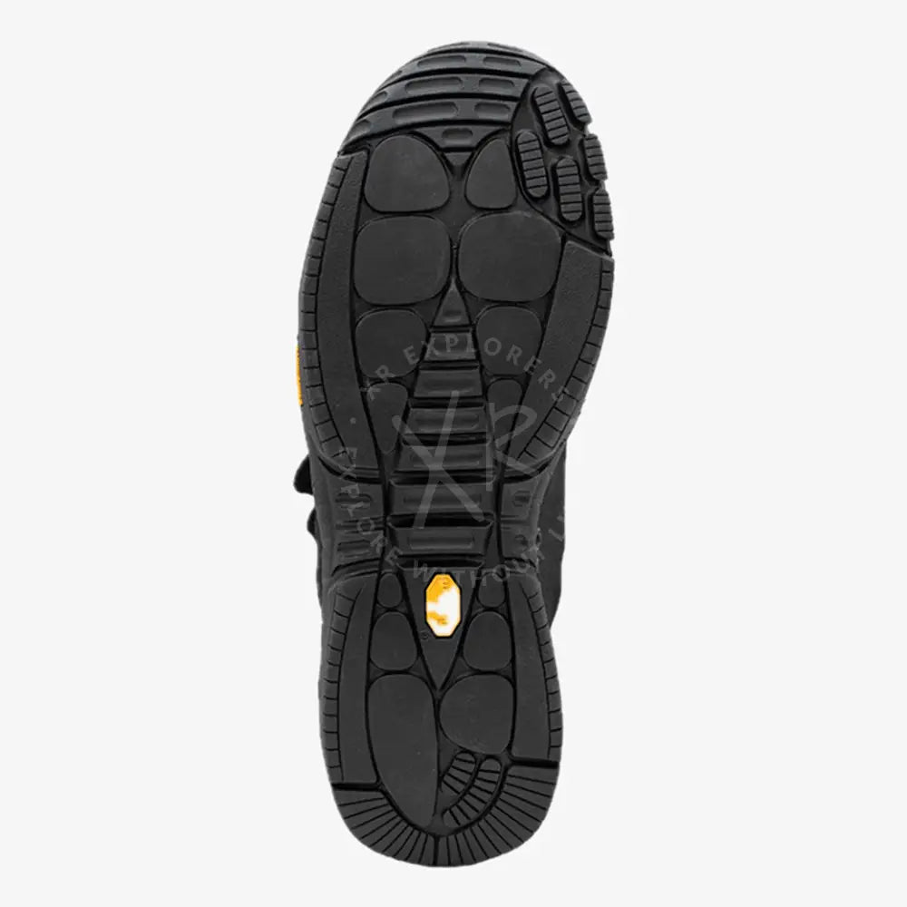 Black sole of a shoe with a yellow logo on a white background