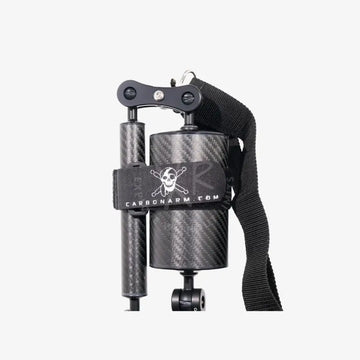 Black carbon fiber tripod arm with skull and crossbones logo on strap from shoulder strap kit