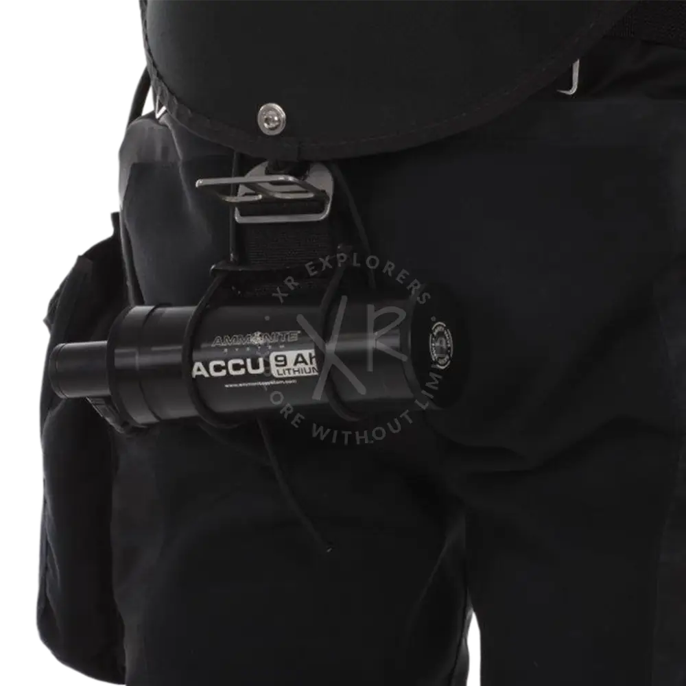 Black cylindrical lithium-ion battery labeled accu 9 ah by ammolite secured with black strap on sidemount accu holder