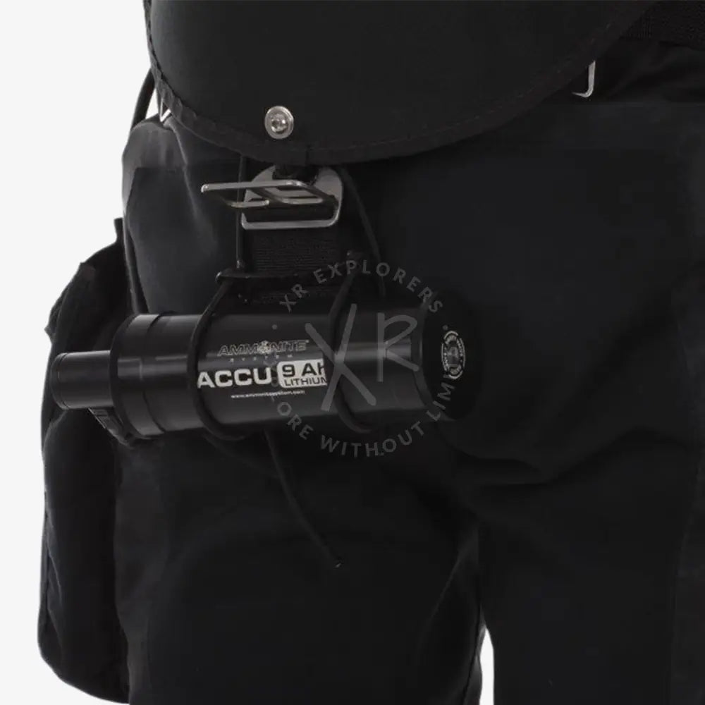 Black cylindrical lithium-ion battery labeled accu 9 ah by ammolite secured with black strap on sidemount accu holder