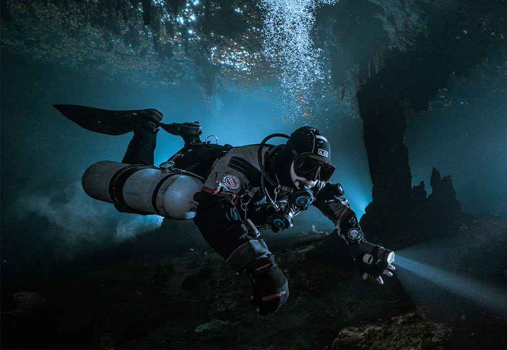 Sidemount diver practicing wreck penetration and maneuverability skills for Bahrain students
