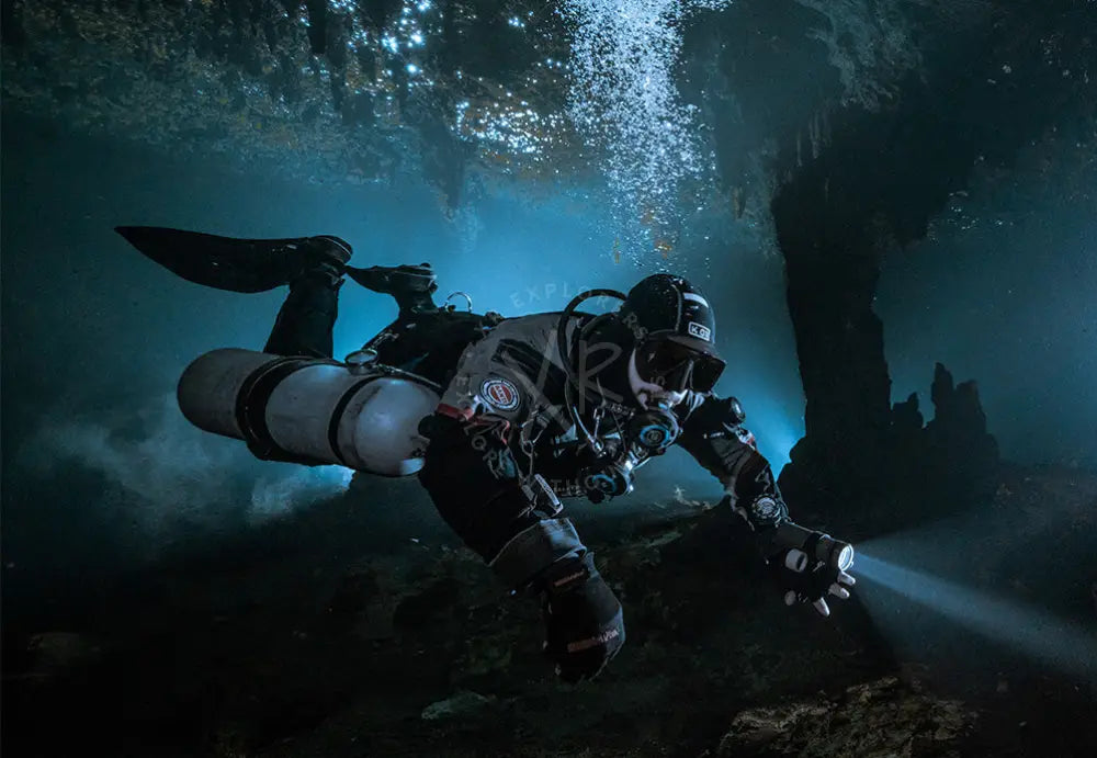 Sidemount diver practicing wreck penetration and maneuverability skills for Bahrain students