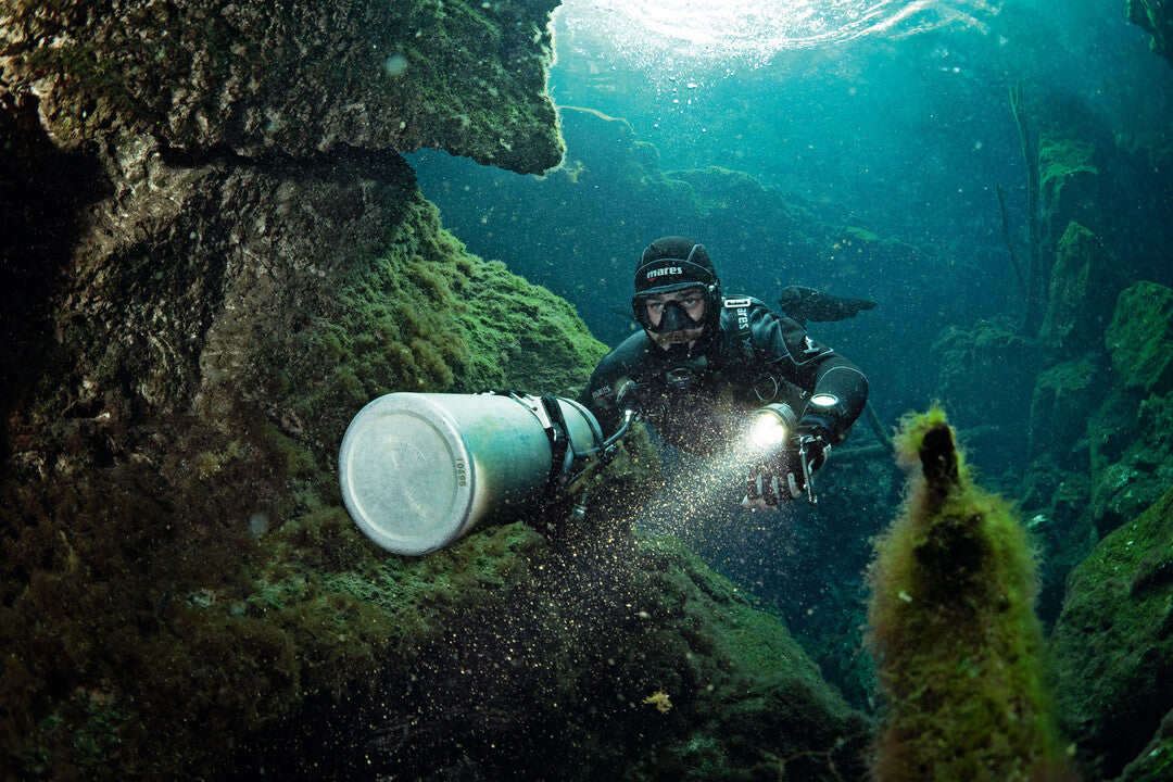Sidemount diver performing valve drill during foundations workshop in Oman