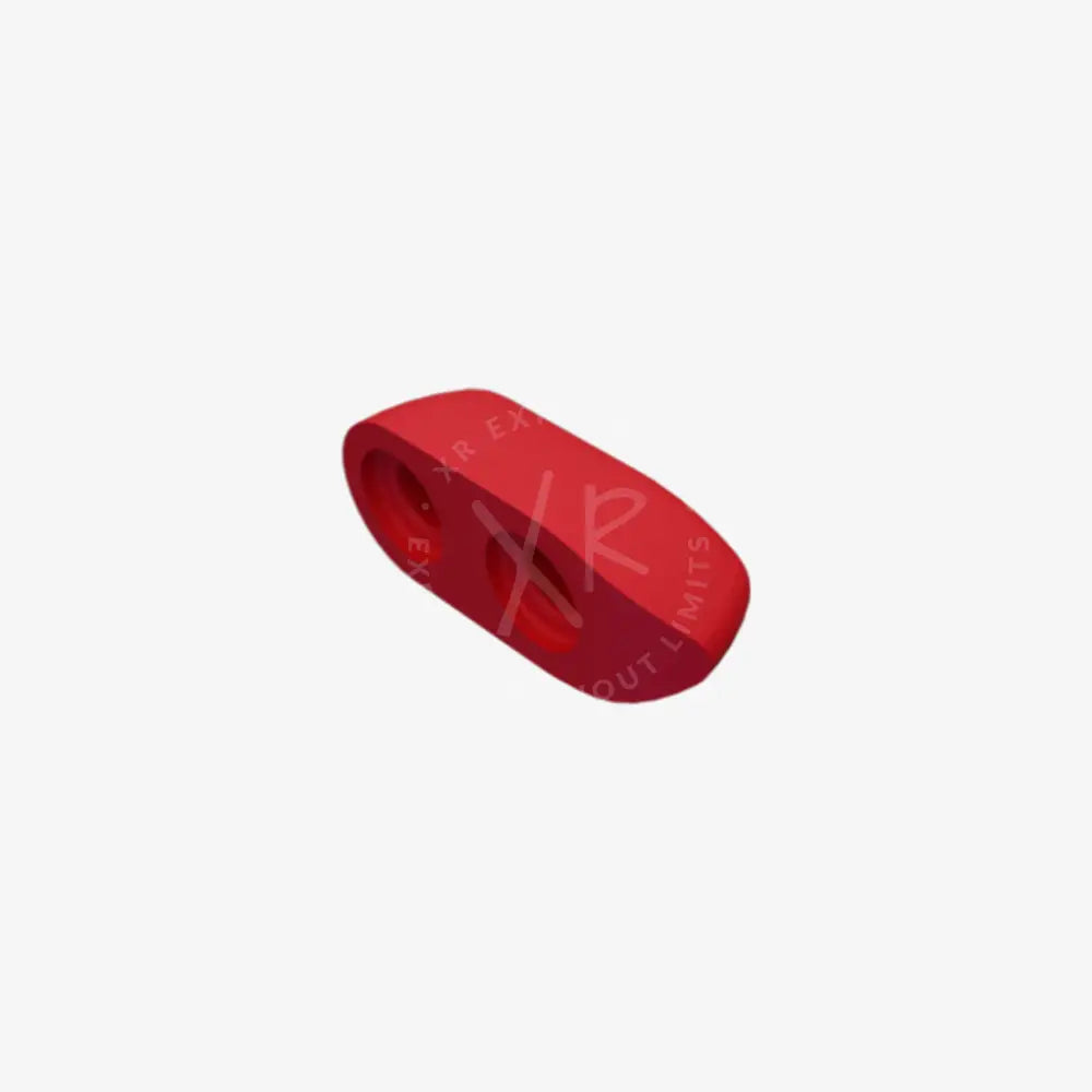 Red silicone blind plug with two circular holes and a plastic connector for secure sealing and protection