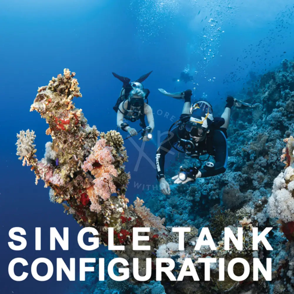 Two scuba divers in black wetsuits explore a vibrant coral reef underwater in single mastery product image