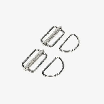 Two pairs of stainless steel sliding D-rings for sidemount diving, isolated on a white background.