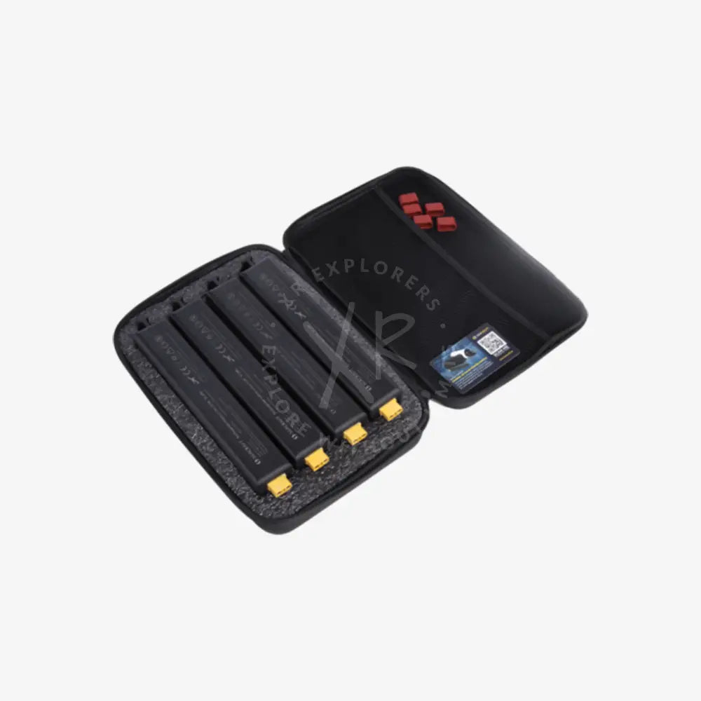 Black soft transport case containing four black batteries with yellow connectors for air-travel safe storage