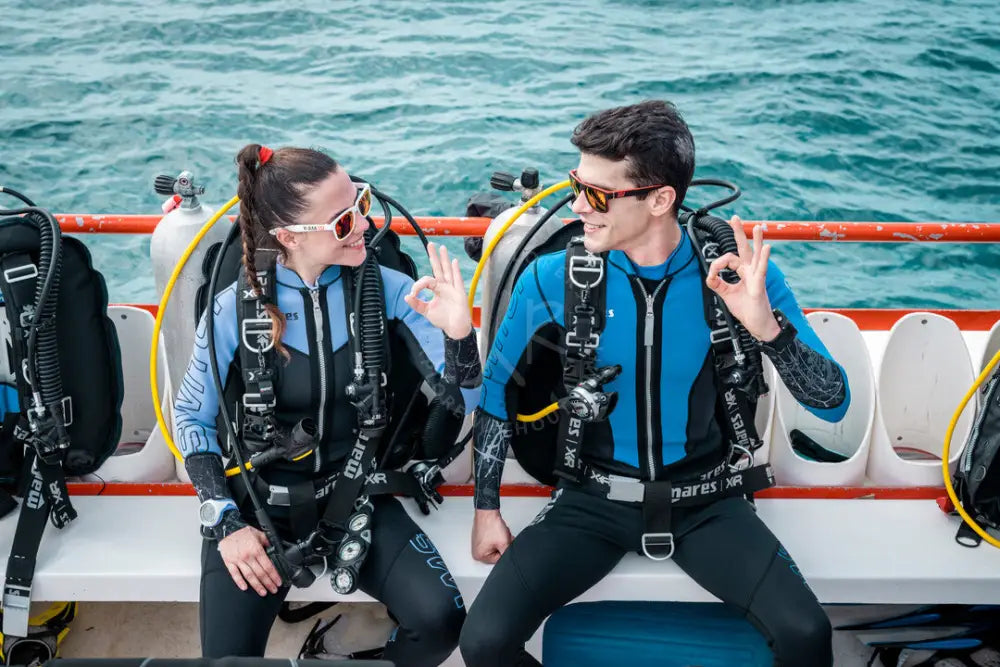 Divers preparing gear on the dive deck of a liveaboard boat in Saudi Arabia KSA with XR Explorers