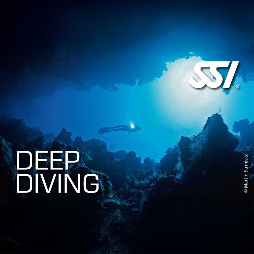 Promotional image for SSI Deep Diver course featuring a diver underwater with a flashlight, exploring a dark aquatic environment.