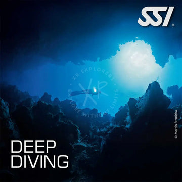 Promotional image for SSI Deep Diver course featuring a diver underwater with a flashlight, exploring a dark aquatic environment.
