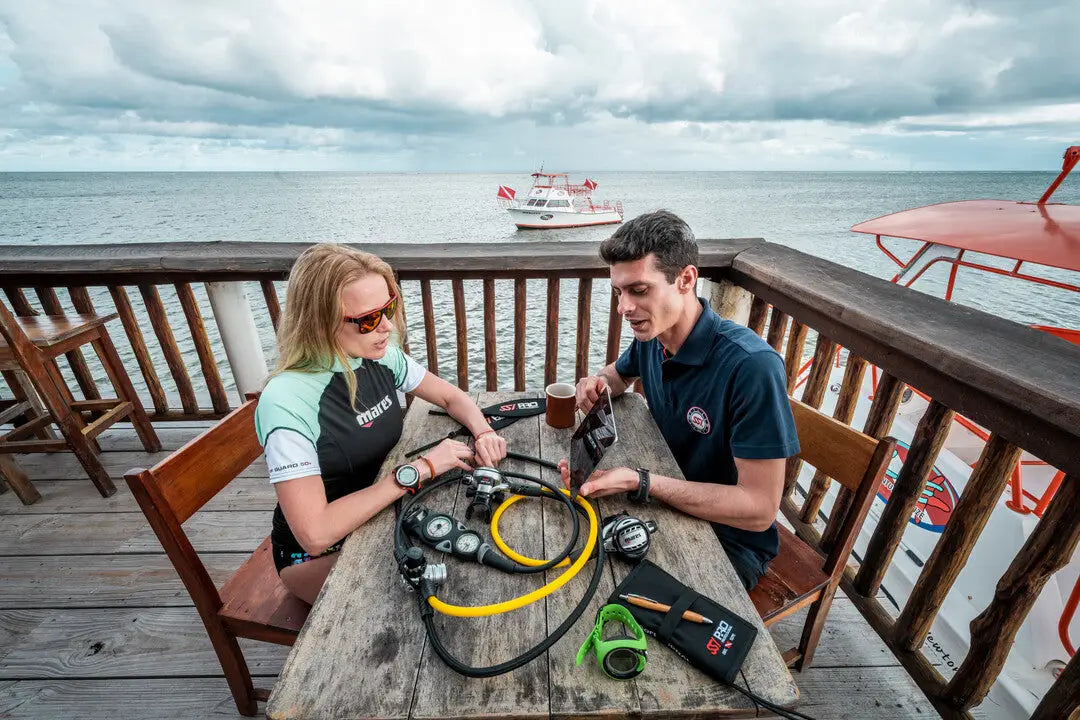 DIR equipped dive guide giving safety instructions to divers in Dubai UAE