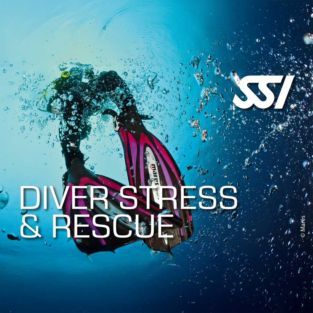Underwater image featuring diving equipment with the text 'DIVER STRESS & RESCUE' prominently displayed, indicating the course's focus on emergency diving situations.