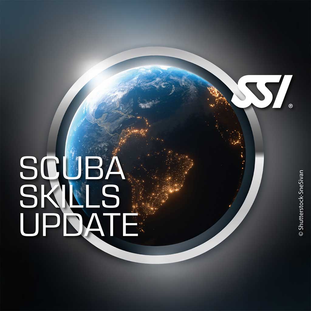 Promotional graphic for SSI Scuba Skills Update featuring an image of Earth from space with city lights visible, emphasizing the theme of underwater skills update.