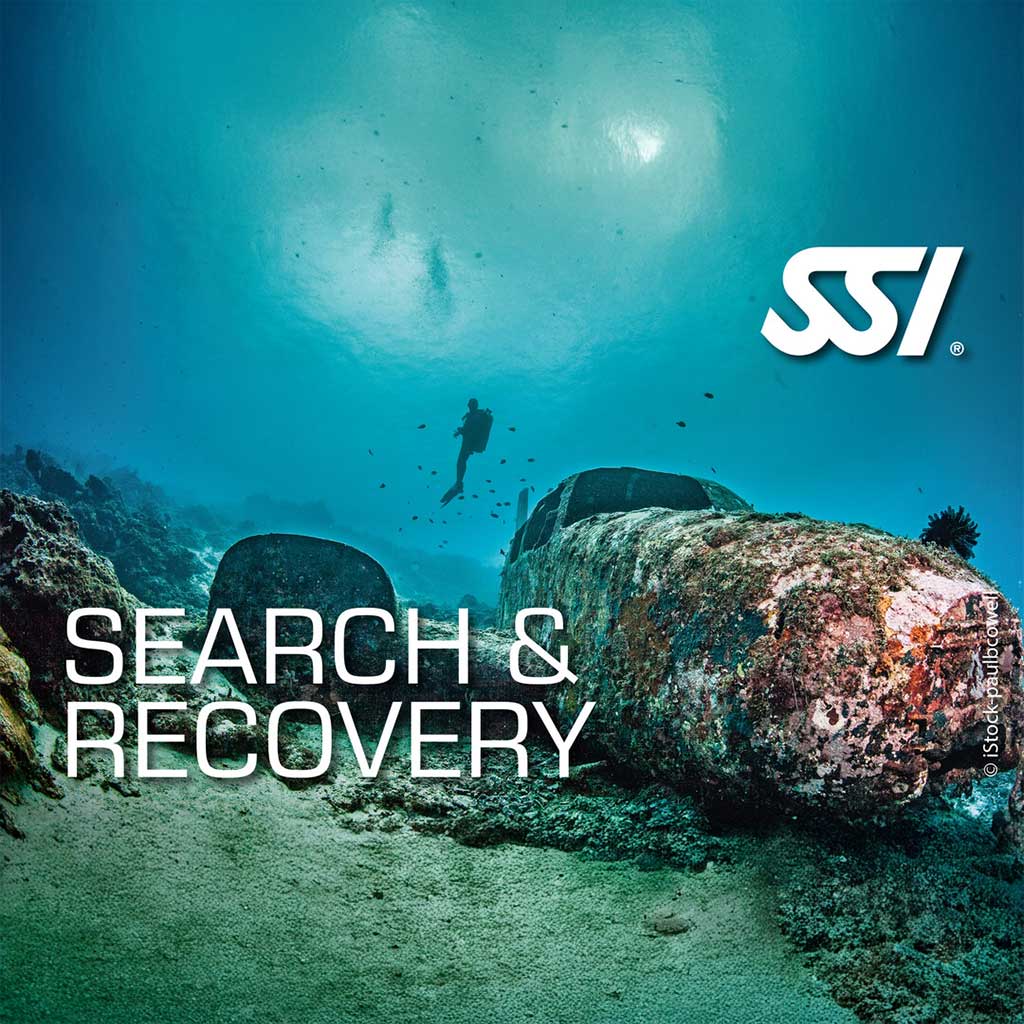 Underwater scene with a diver and a sunken shipwreck, showcasing the SSI Search & Recovery specialty course.