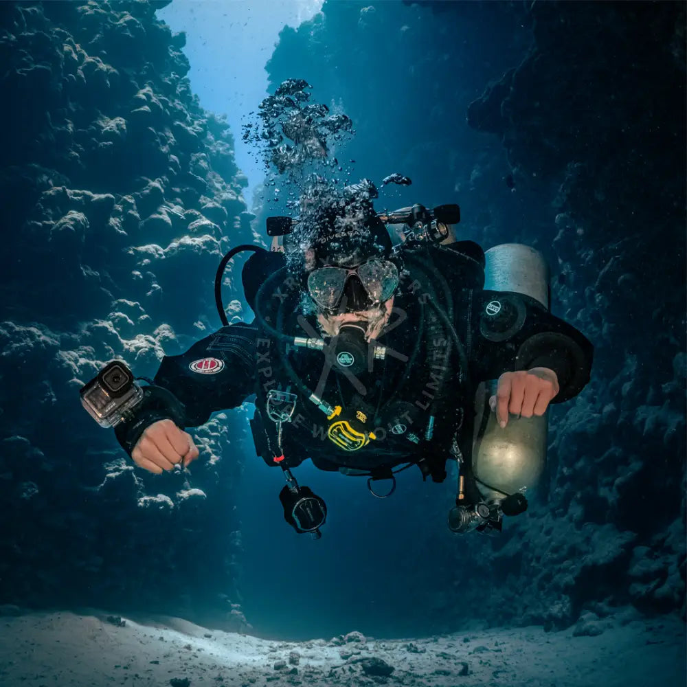 Technical diver using drysuit for warmth during long decompression stops in Qatar