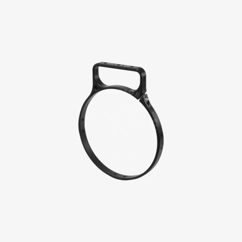 Black metal transport bracket camera rig mount with rectangular handle and circular ring for secure grip