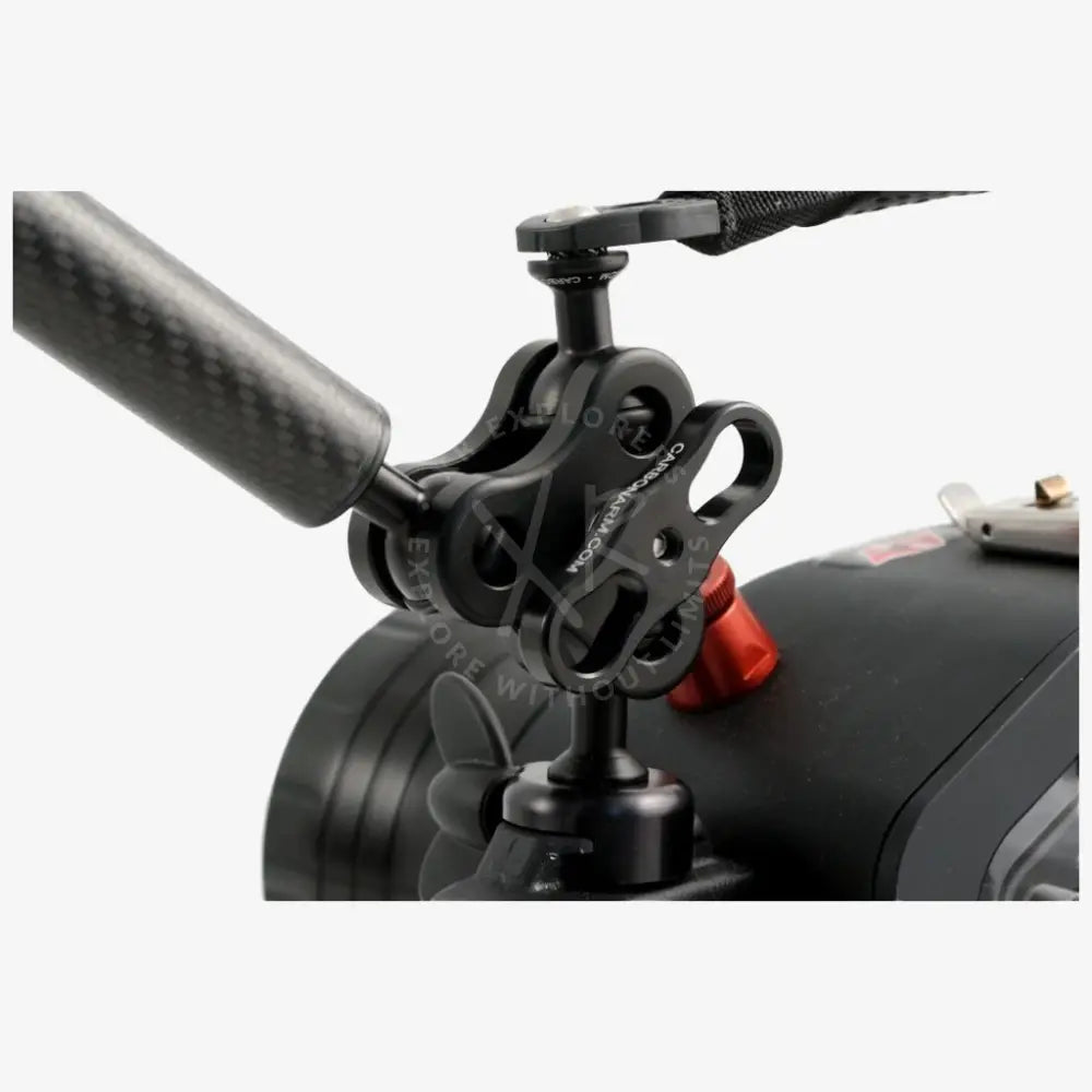 Black carbon fiber triple clamp camera mount with red adjustment knob and textured grip for secure handling