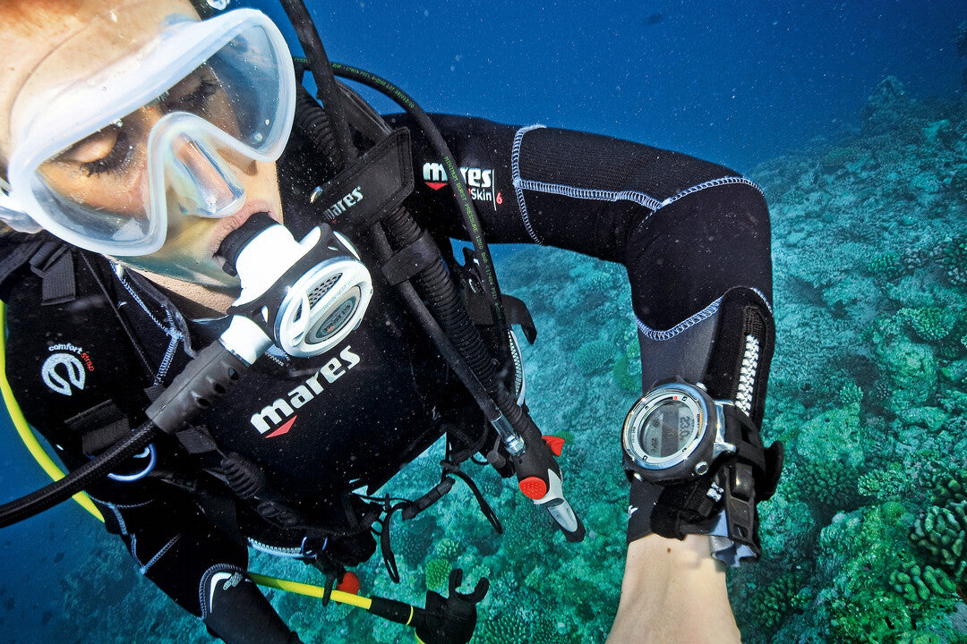 Diver using sand ripples and rock formations for natural navigation in Saudi Arabia KSA